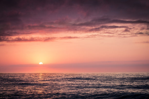 Fototapete Wundervoller Sonnenuntergang am Horizont